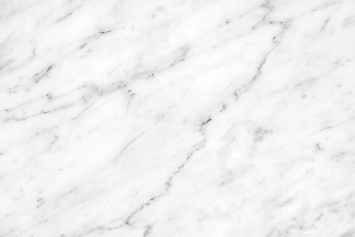 White Carrara marble surface with soft natural veining